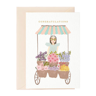 Tarjeta de felicitación con puesto de flores